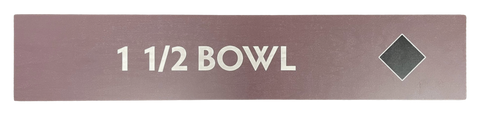 Wooden trail map sign with the text, '1 1/2 Bowl' and a black diamond icon