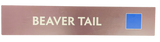 Wooden trail sign with the text, 'Beaver Tail' and a blue square icon