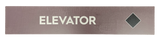Wooden trail map sign with the text, 'Elevator' and a black diamond icon