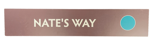 Wooden trail sign with the text, 'Nate's Way' and a green circle icon