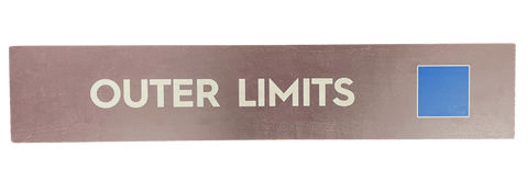 Wooden trail sign with the text, 'Outer Limits' and a blue square icon
