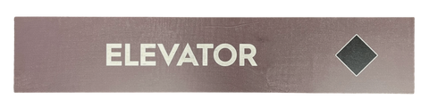 Wooden trail map sign with  the text 'Elevator' and a black diamond icon