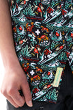 Close-up of a patterned shirt with a visible brand label.