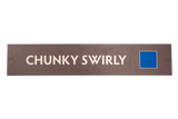 Brown rectancular sign with,'Chunky Swirly' text and a blue square icon