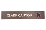 Rectangular sign with 'CLARK CANYON' text