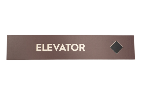 Rectangular sign with 'Elevator' text on a brown background