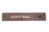 Rectangular sign with 'GOD'S WALL' text on a brown background