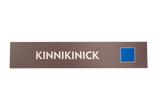 Rectangular brown sign with 'Kinnikinick' text