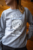 Grey sweatshirt with 'Let it Snow!' and snow globe