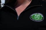 Close up of quarter zip sweatshirt featuring a Mt. Hood Meadows Nordic Center logo.