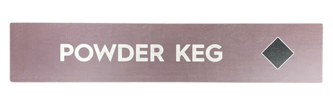 Wooden trail sign with the text, 'Powder Keg' and a black diamond icon