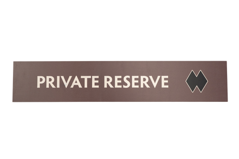 Rectangular brown sign with 'PRIVATE RESERVE' 