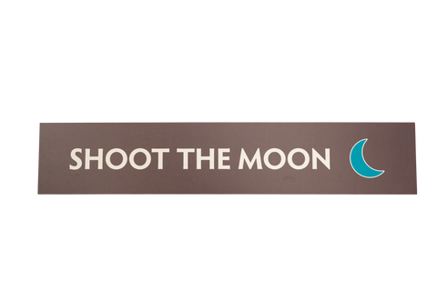 Brown rectangular sign with 'Shoot the Moon' text and a green crescent moon icon