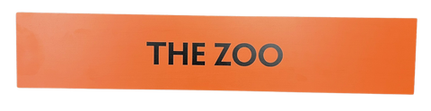 Wooden trail sign with the text, 'The Zoo'